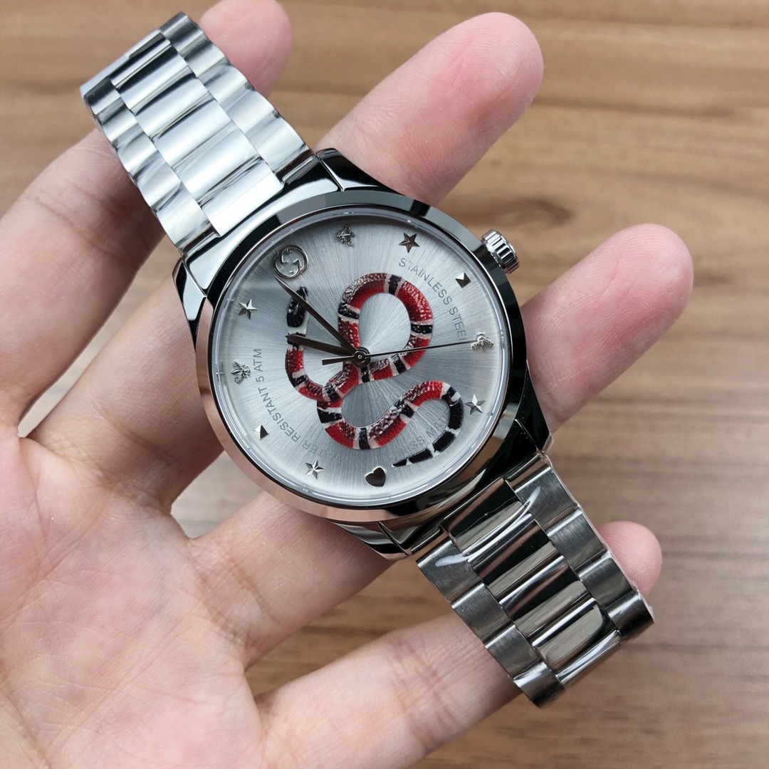 NO:156428,Batch: Original box: 30 Gucci G-Timeless watch, quartz neutral watch, watch diameter 38mm, sapphire crystal glass, stainless steel case, strap, surface decoration with a snake pattern, waterproof 50m, gucci19860909批: 原盒:30 古驰 G一Timeless腕表,石英中性表,表径38mm,蓝宝石水晶玻璃,精钢表壳、表带,表面饰以灵蛇图案,防水50m,,gucci,Watch
