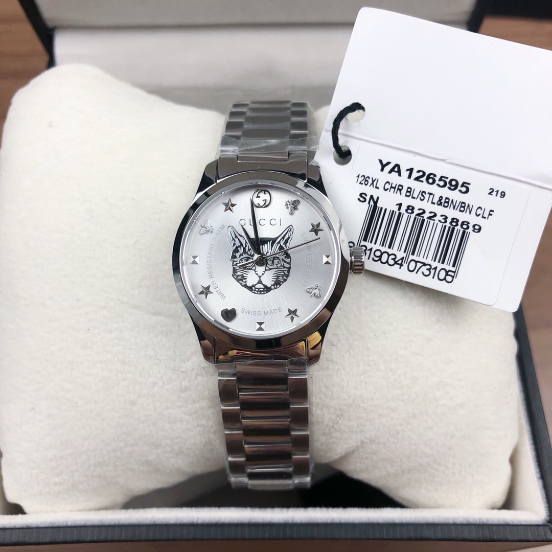 NO:388935,Gucci G-Timeless watch, 29mm diameter, sapphire crystal glass, surface decorated with silver tiger head pattern, stainless steel strap, case, waterproof 50m, gucci19860909古驰G一Timeless腕表,表径29mm,蓝宝石水晶玻璃,表面饰以银色虎头图案,精钢表带、表壳,防水50m,,gucci,Watch