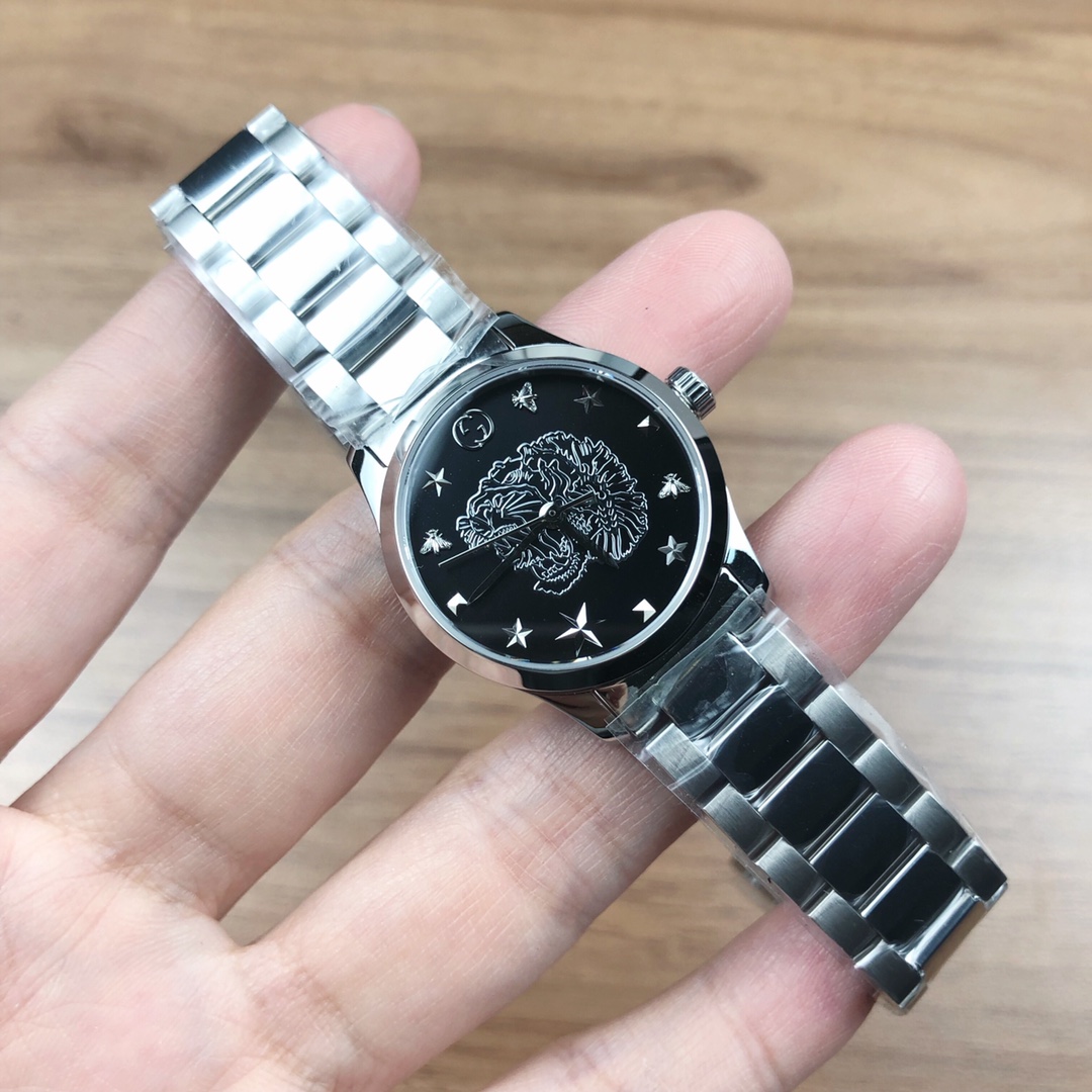 NO:388556,Batch: Original box: 30 GUCCI Gucci G-Timeless watch, quartz women's watch, watch diameter 29mm, sapphire crystal glass, stainless steel case and strap, surface decoration with silver tiger head pattern, waterproof 50m, gucci, gucci19860909批: 原盒:30 GUCCI 古驰G一Timeless腕表,石英女表,表径29mm,蓝宝石水晶玻璃,精钢表壳、表带,表面饰以银虎头图案,防水50m,,gucci,gucci,Watch