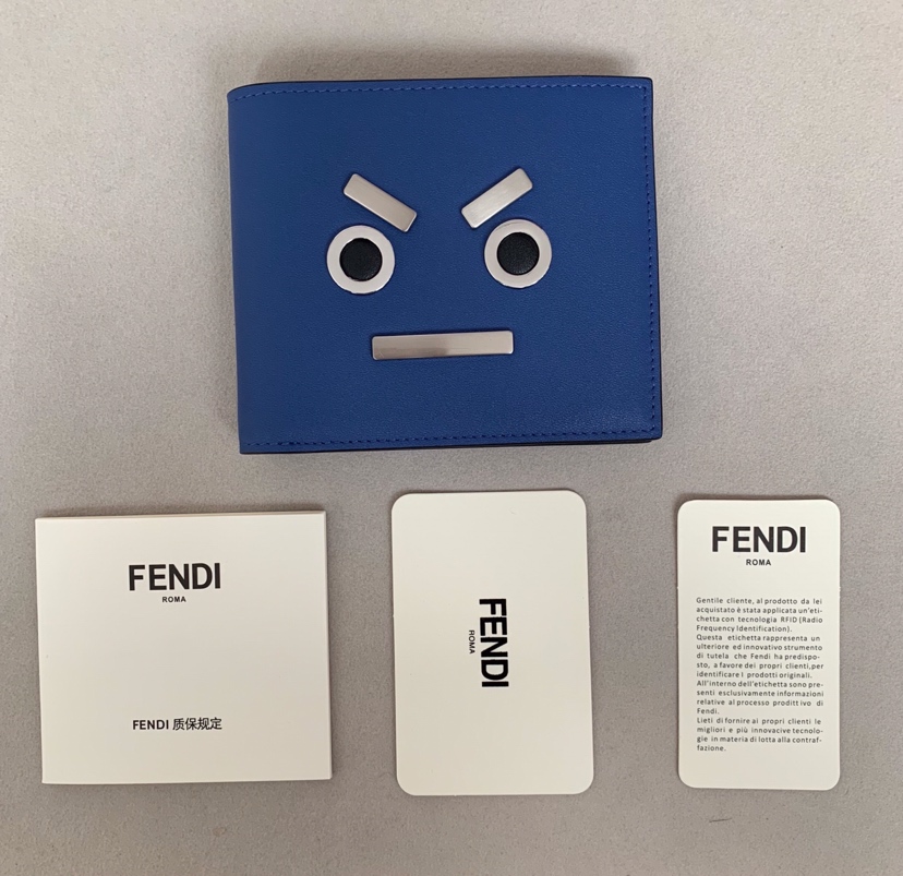 [Fendi Wallets]Calfskin folding wallet Speechless expression composed of metal