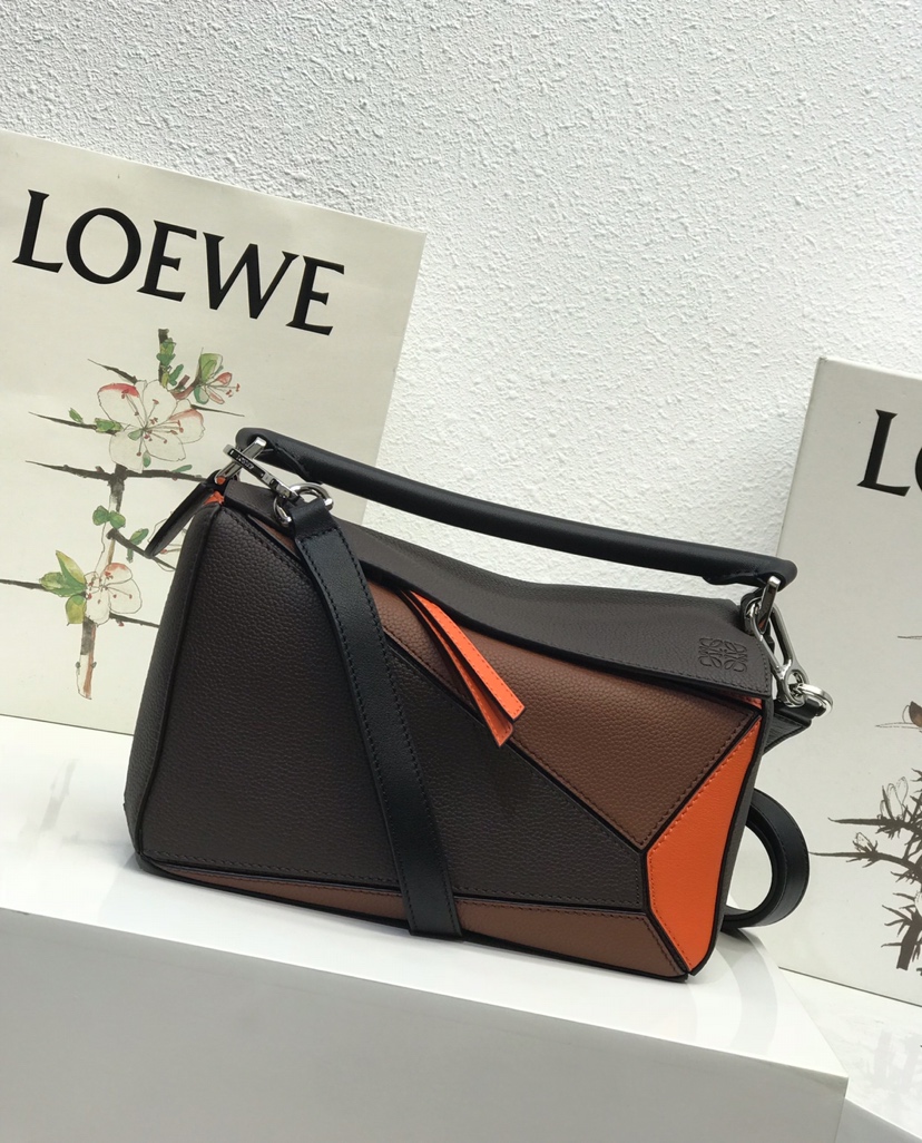(Color: Brown) Puzzle from Lao Luo's Home (latest design from the counter, no interface, full leather lining) with top private custom hardware made of stainless steel carving. Made with imported Spanish calf leather, soft and velvety texture. Precise cutting of leather allows for natural folding, can be hand-carried or worn crossbody (multiple uses). Long shoulder strap is detachable, with textile lining. Model: 300188 Size: 24-14-11. image 1