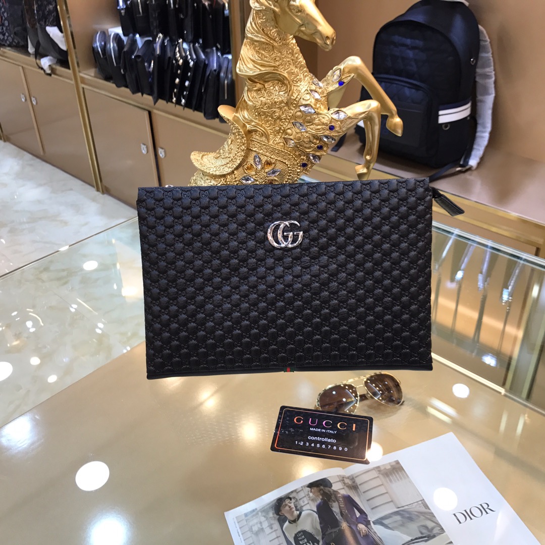 K5  GUCCI古驰8191-7，进口头层牛皮、手感非常柔软、高品质五金，特别有档次，设计简单，帅气、耐看、喜欢的赶紧下单吧28*18*2