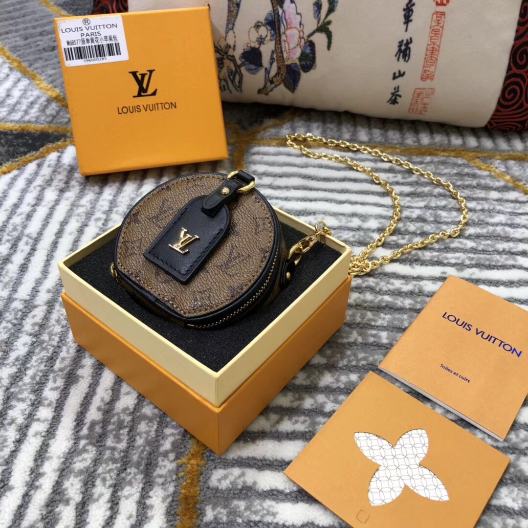 Louis Vuitton LV Boite Chapeau Crossbody & Shoulder Bags Yellow Printing Monogram Reverse Canvas Chains M68577