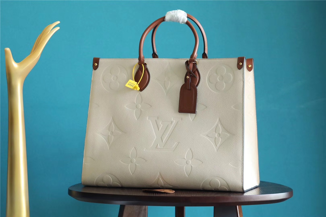 Louis Vuitton LV Onthego Handbags Tote Bags Apricot Color Printing Empreinte​ Calfskin Cowhide Mini M44576