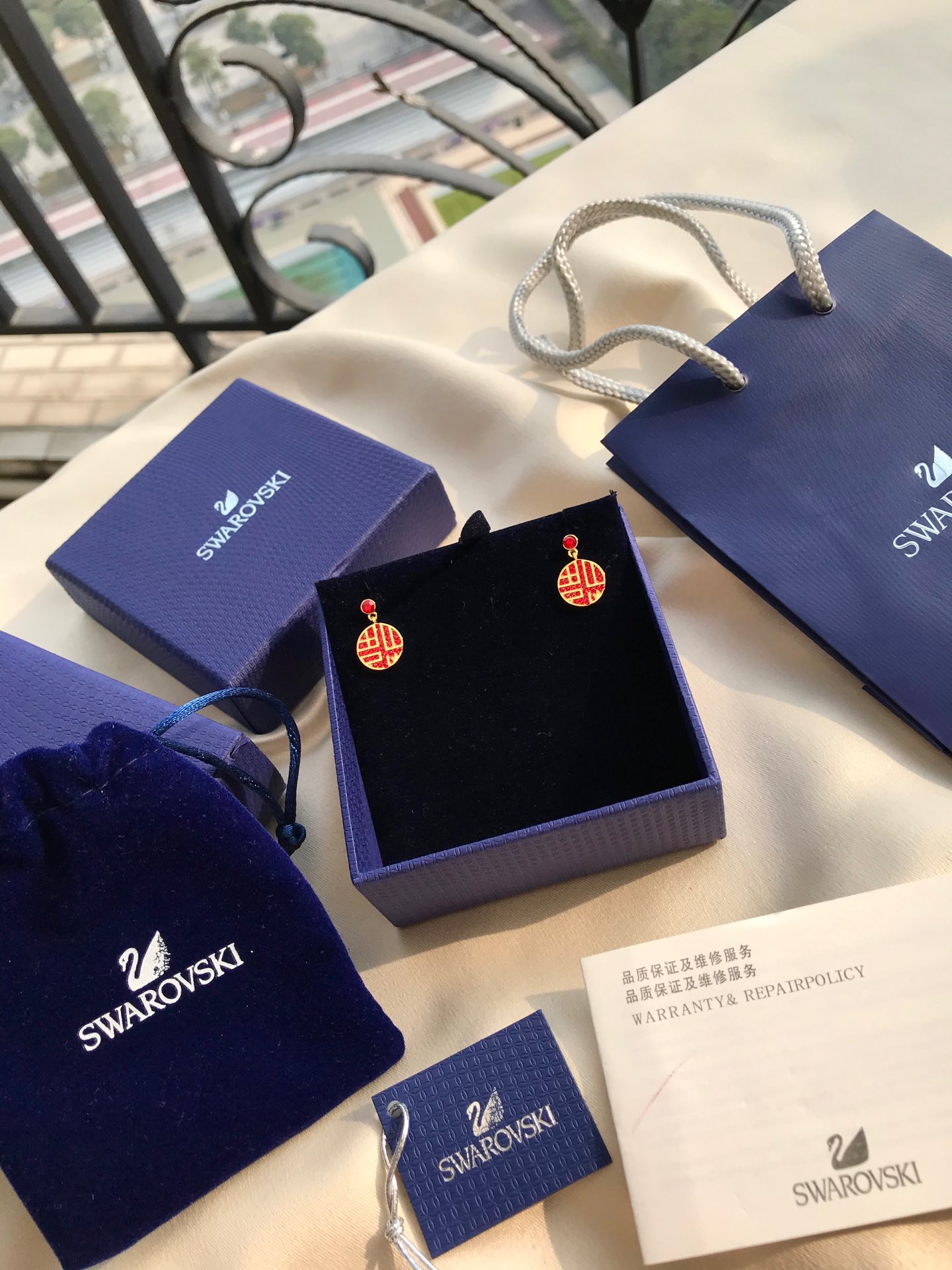 NO:104166,Swarovski SWAROVSKI New Year gift blessings to earrings, welcome the New Year, blessings are overflowing!  Blessings will reach the New Year, adding good luck to life!  Swarovski jointly named the Palace Museum Culture, injecting the essence of Chinese traditional culture into fashionable design, and reversing the design concept of 