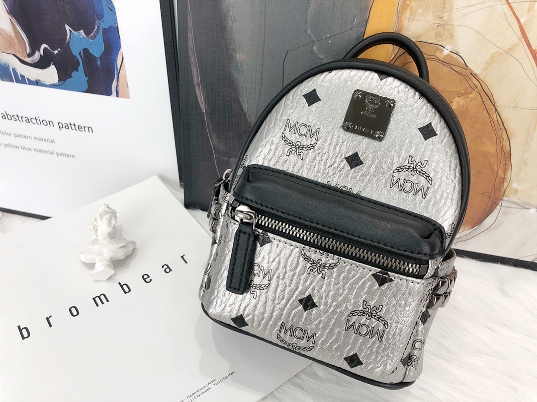 Top quality 💐 upgraded version of the classic MCM mini bag features our iconic Visetos coated canvas, luxurious faux leather lining, and rivet trim. This versatile piece can be worn as a shoulder bag, crossbody bag, single shoulder bag, waist bag, or handbag. Sizes: Super mini 17cm wide x 21cm high x 9cm thick, Mini 21cm wide x 29cm high x 11cm thick, Small 26cm wide x 33cm high x 13cm thick, Medium 34cm wide x 41cm high x 15cm thick. P Super mini 38, Mini 40, Small 42, Medium 44. image 1