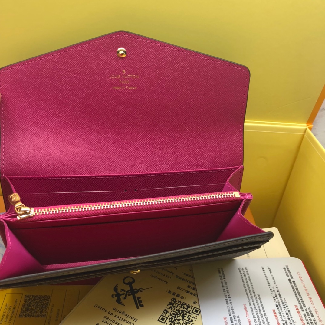 エレガントなモノグラム帆布の信封式財布