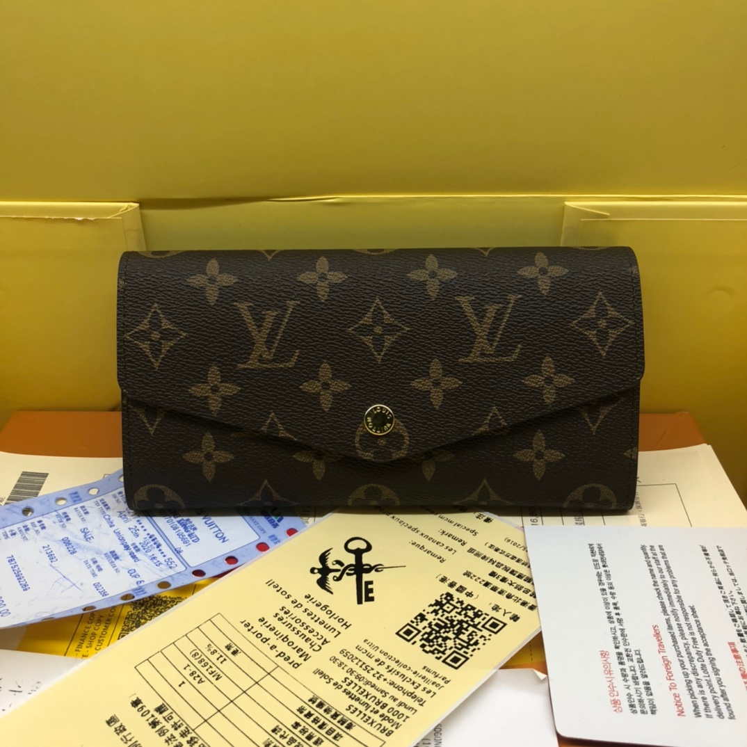 エレガントなモノグラム帆布の信封式財布