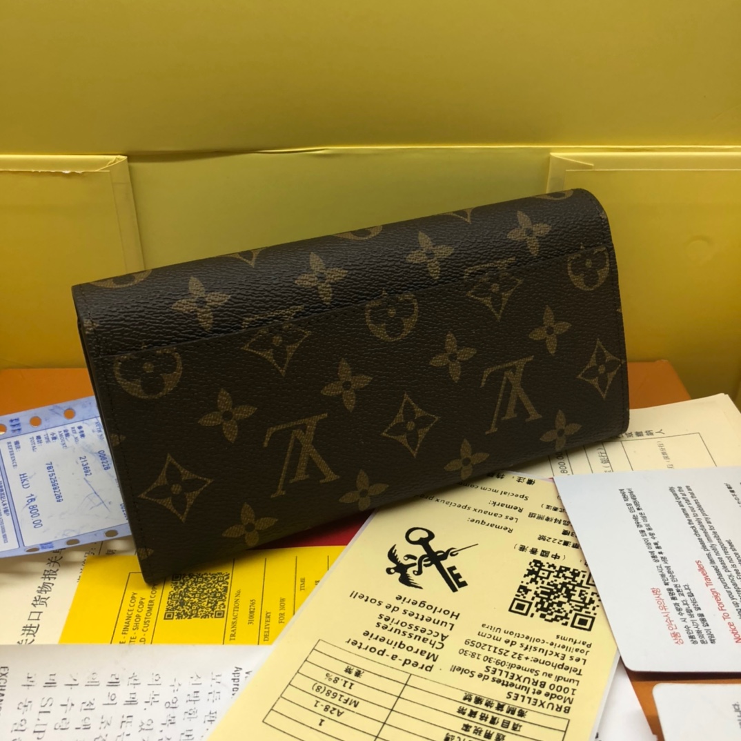 エレガントなモノグラム帆布の信封式財布