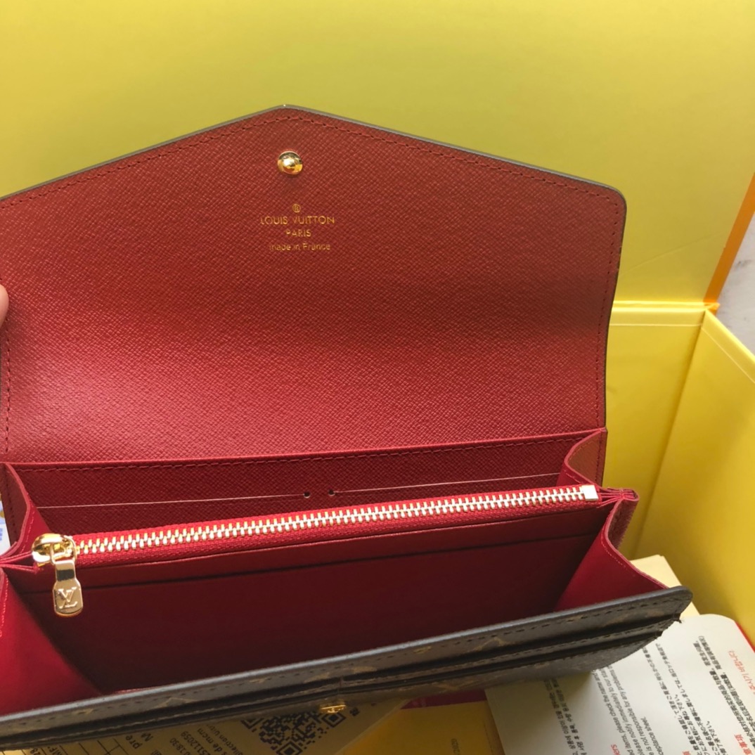 エレガントなモノグラム帆布の信封式財布