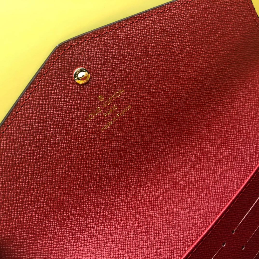 エレガントなモノグラム帆布の信封式財布