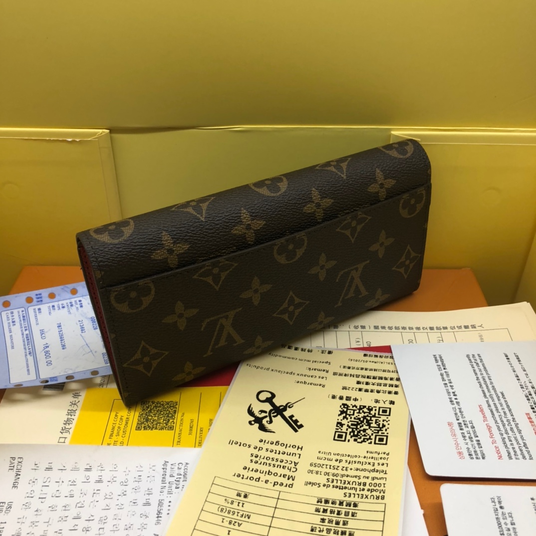 エレガントなモノグラム帆布の信封式財布