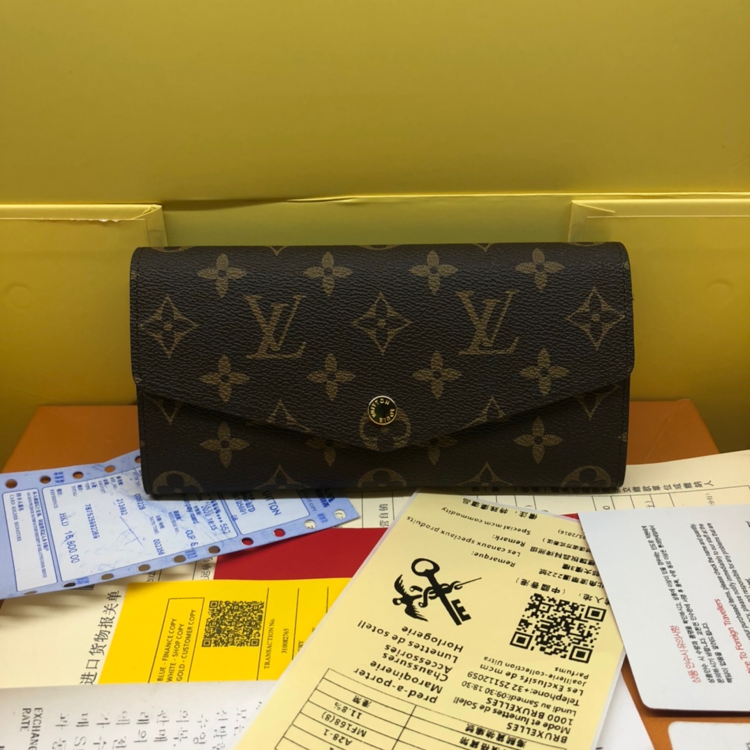 エレガントなモノグラム帆布の信封式財布