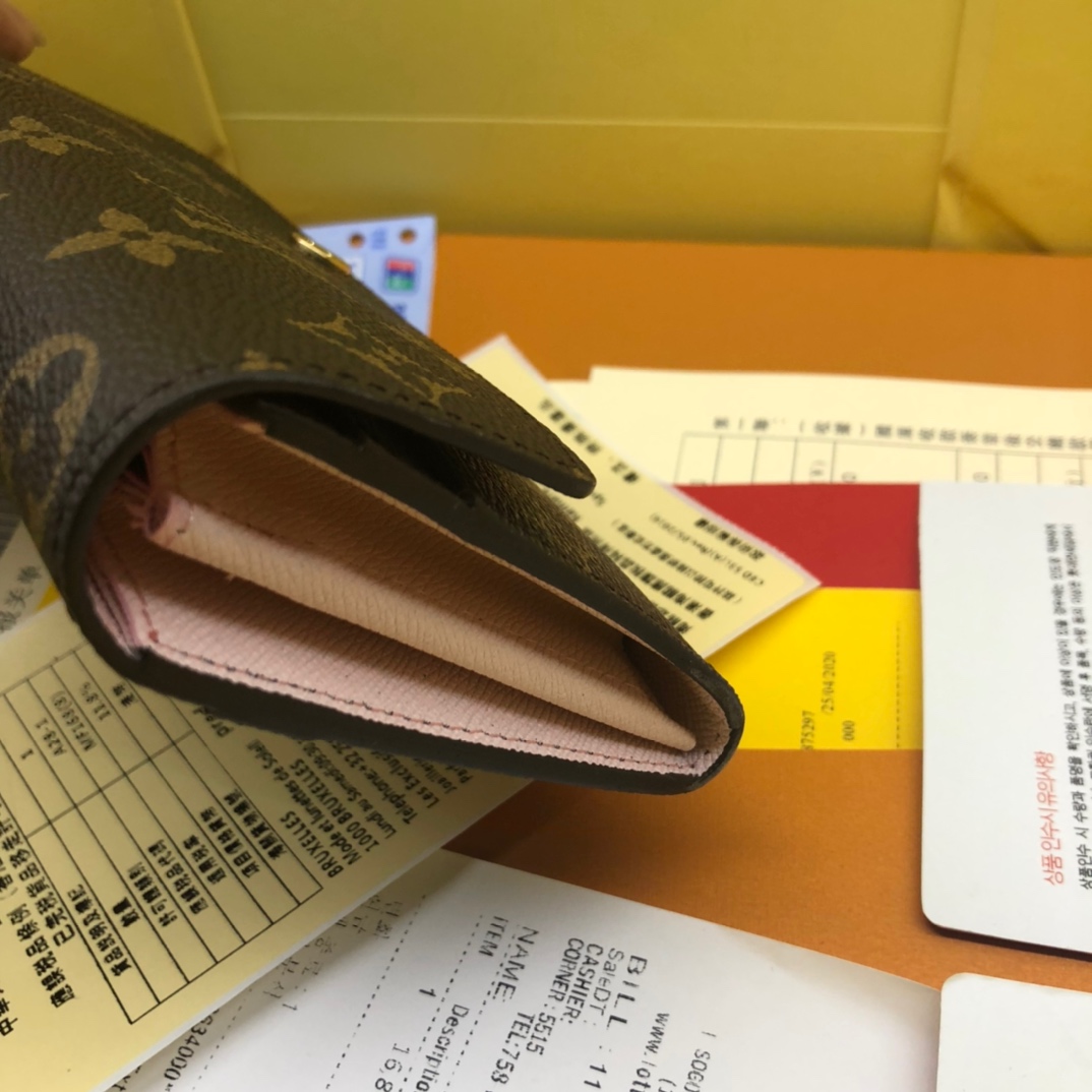 優雅なモノグラム帆布の信封式財布