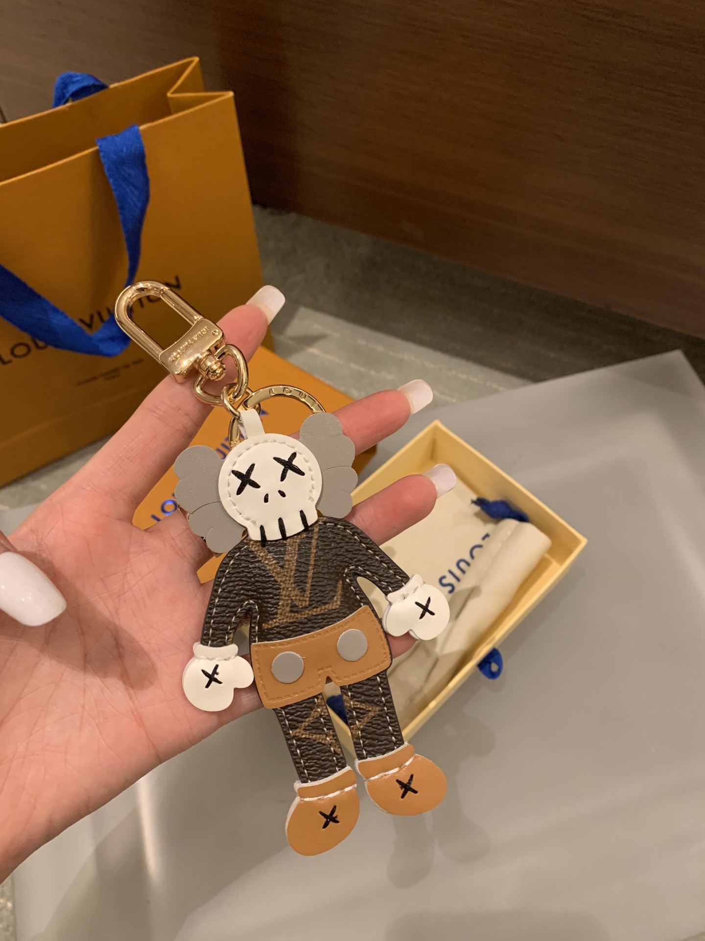 KAWS Companion leather keychain side
