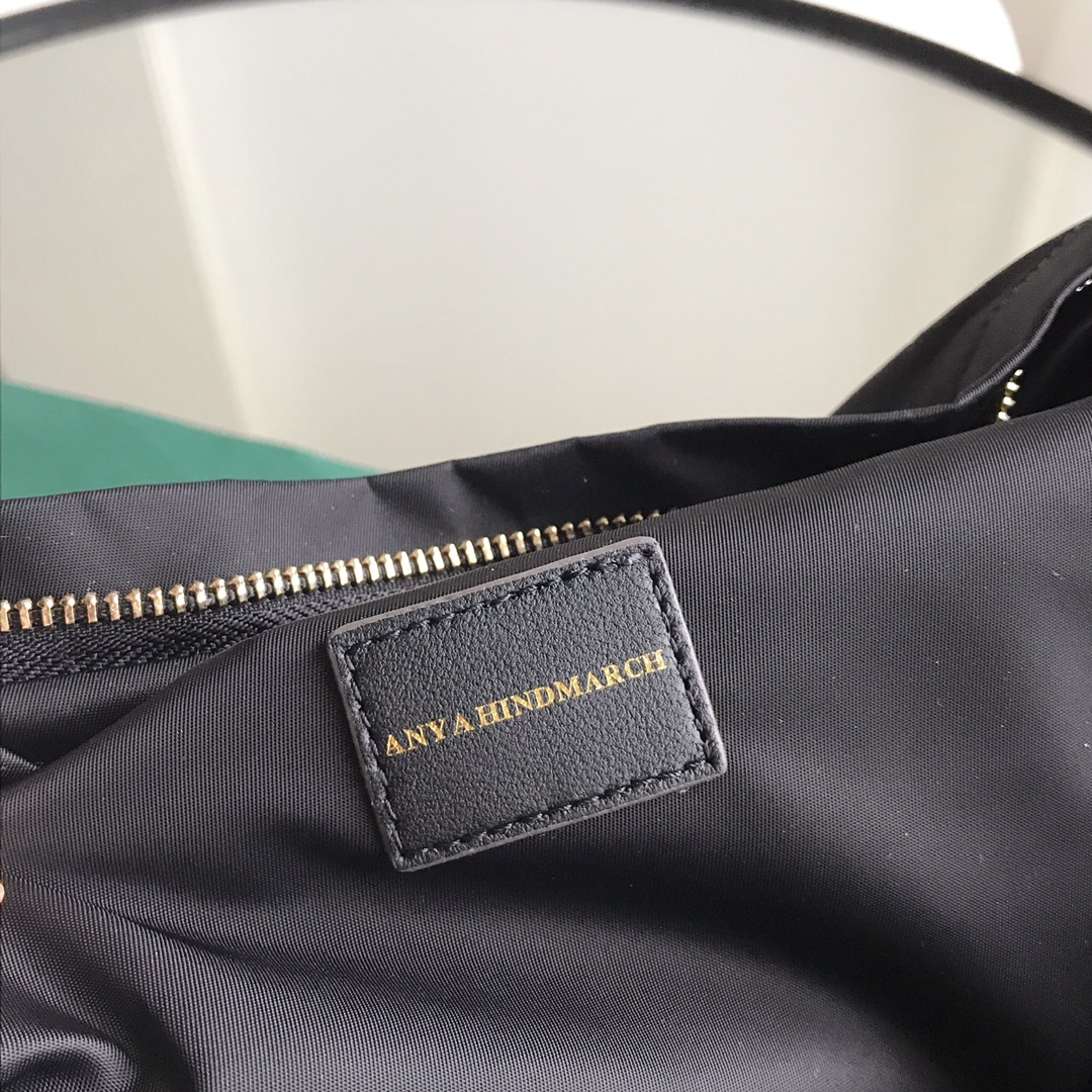 Anya Hindmarch Smiley Backpack featuring the brand's signature smiley - Comprehensive 9