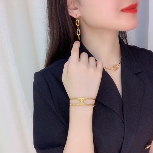 Celine Gold-Tone Brass Triomphe Open Bracelet Bangle for Women 1 Celine Gold-Tone Brass Triomphe Open Bracelet Bangle for Women