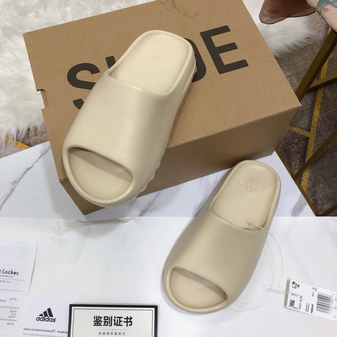 Unknown 男女鞋采用EVA泡棉式一体成形鞋模#配置鞋底凹埳设计亦提供缓震及抓地力 侃爷再度联乘Kanye West x Adidas Yeezy Slide“Bone”椰子户外风格沙滩涉水百搭运动穿搭拖鞋拖鞋
