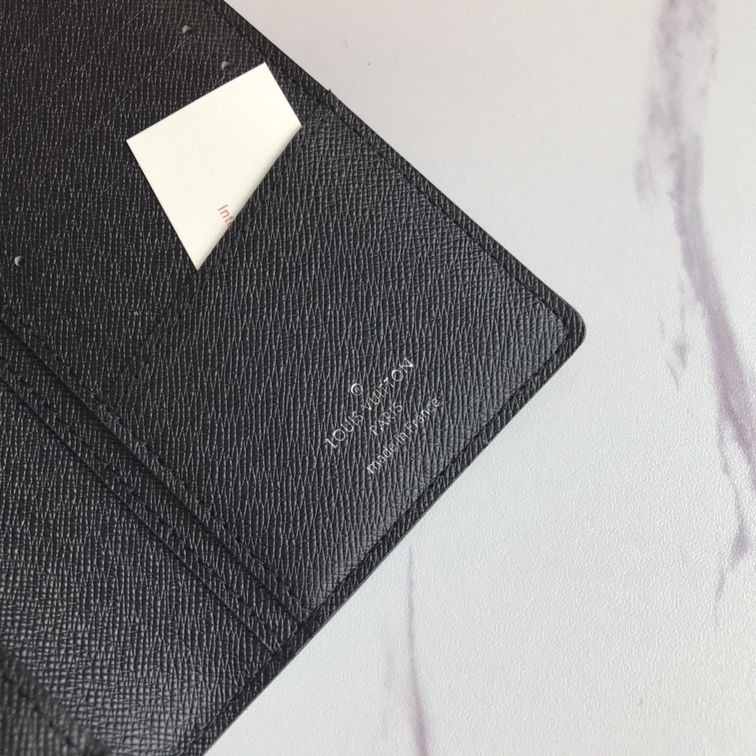 Genuine Leather Bifold Wallet presented in a gift box.