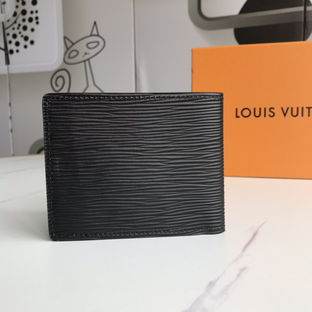 Open leather wallet showing card slots and bill compartment