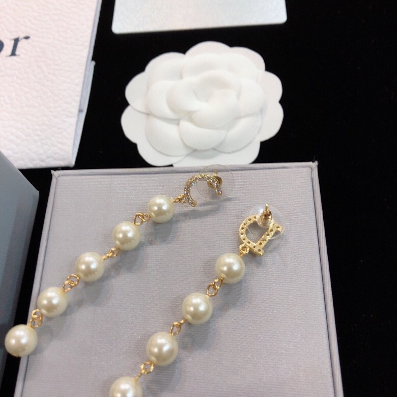 dior gold pearl strand drop earrings