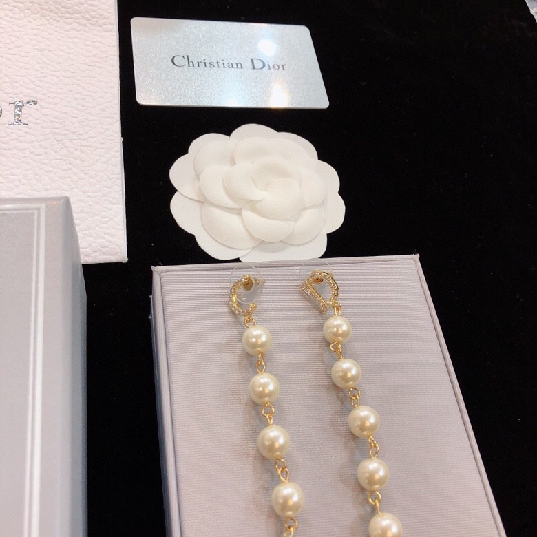 dior gold pearl strand drop earrings