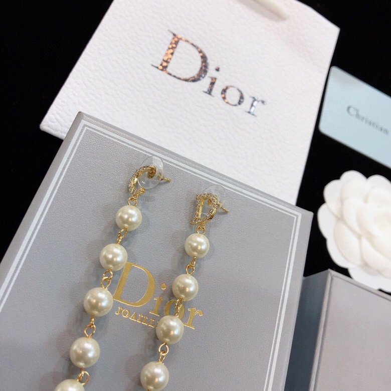 dior gold pearl strand drop earrings