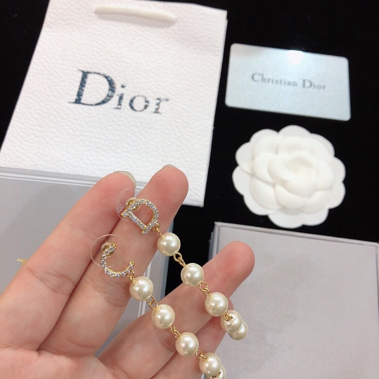 dior gold pearl strand drop earrings