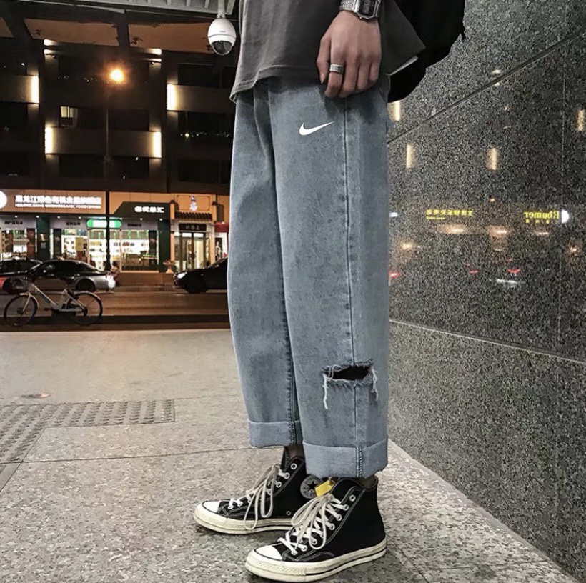 65 nike耐克 两侧破洞直筒牛仔裤情侣款 color: 蓝色 size: m