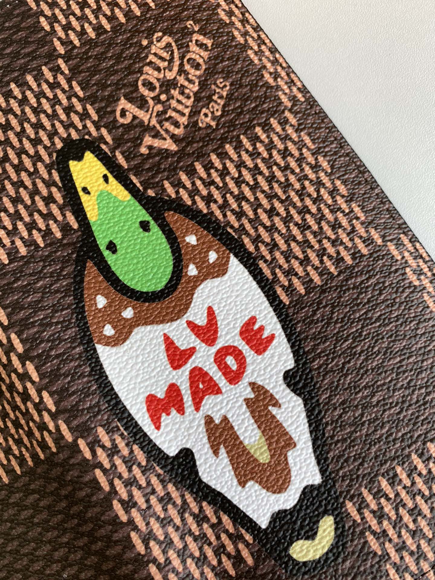 Side profile of a compact leather wallet