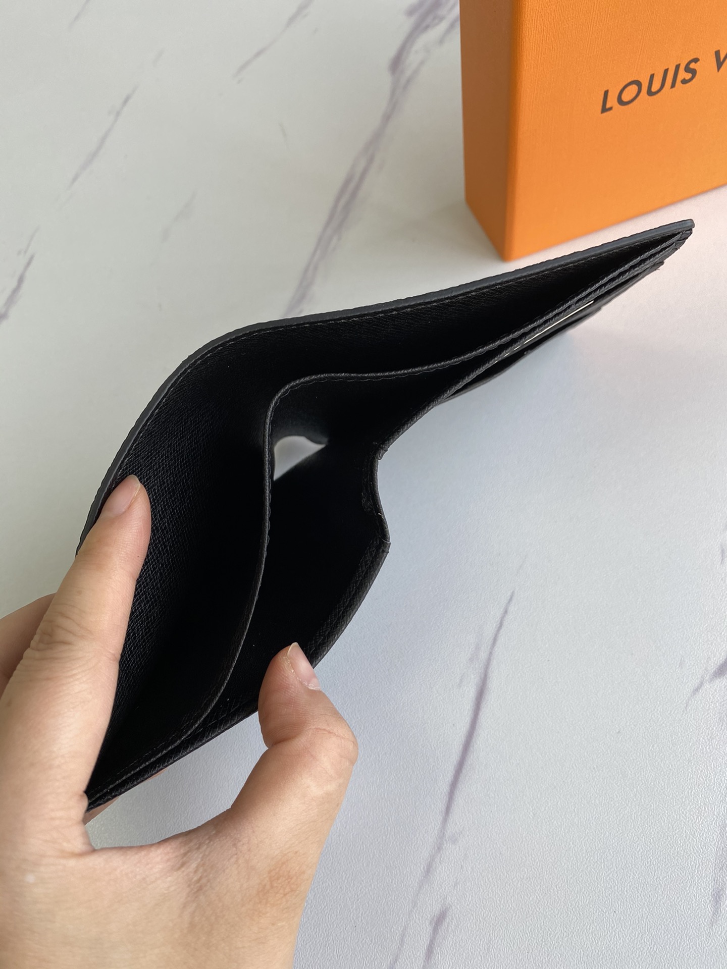 Classic Leather Bifold Wallet in its packaging