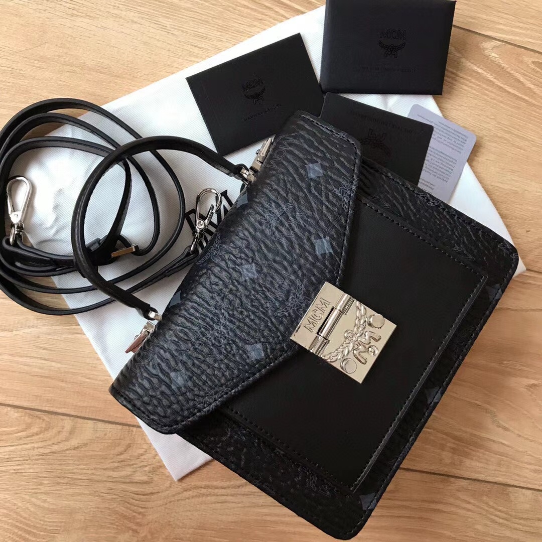 Top-tier MCM Accordion Bag Series - a perfect blend of classic shape and modern design. Made with high-quality leather, faithfully replicating the original. Sturdy and spacious, can be worn over the shoulder or carried by hand. Features multiple accordion-style compartments inside. Small size: 17*21*8cm, Medium size: 27*19.5*11cm. Small and medium sizes available. image 1