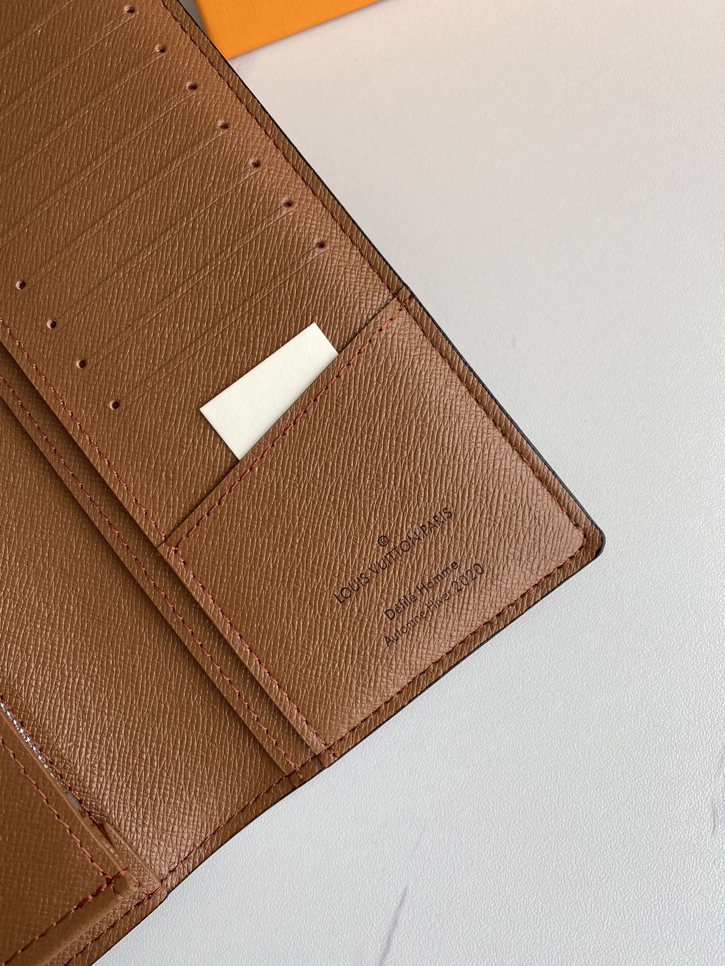 Side view of the leather bifold wallet to show its slim profile