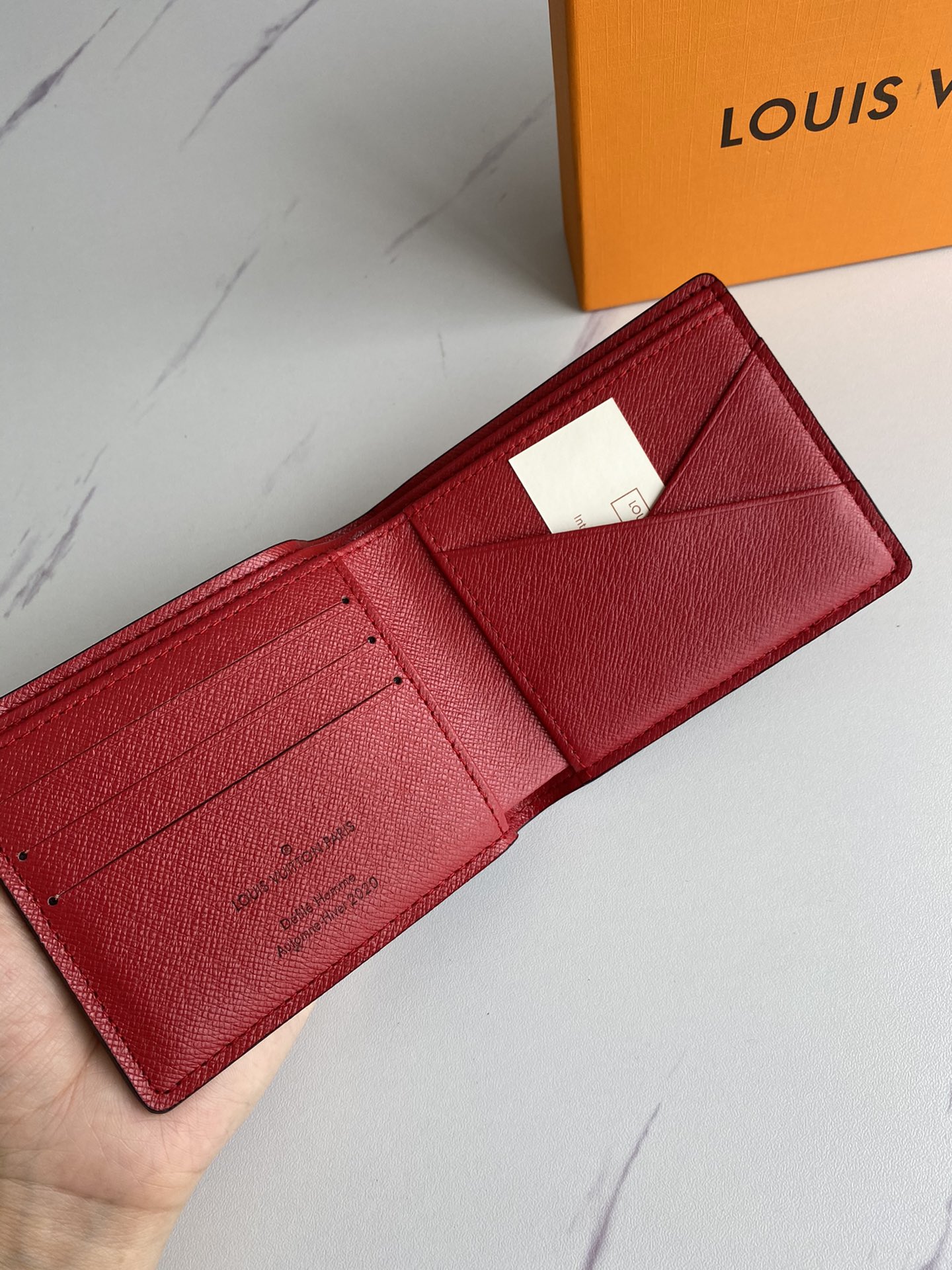Detail of stitching on the leather bifold wallet
