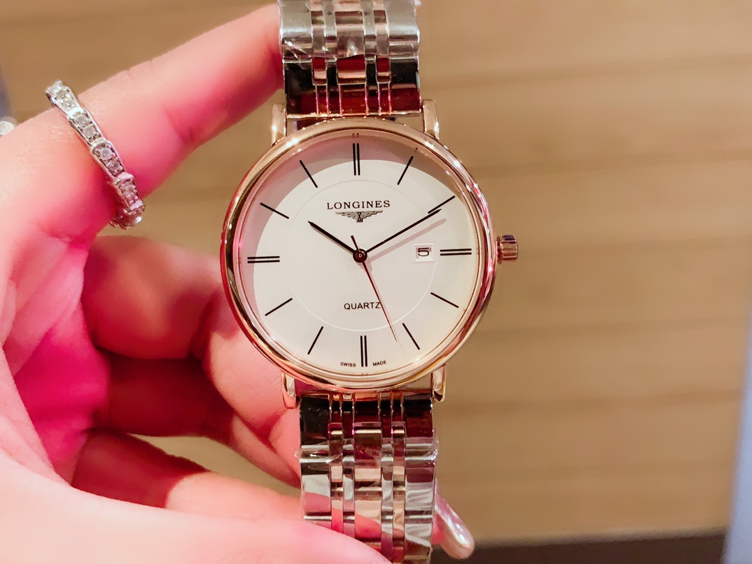 Longines 爱心原装进口石英机316L精钢表壳 矿物质超强玻璃镜面 进口真牛皮表带/精钢表带 女款直径30mm厚8m男款直径40厚底8mm