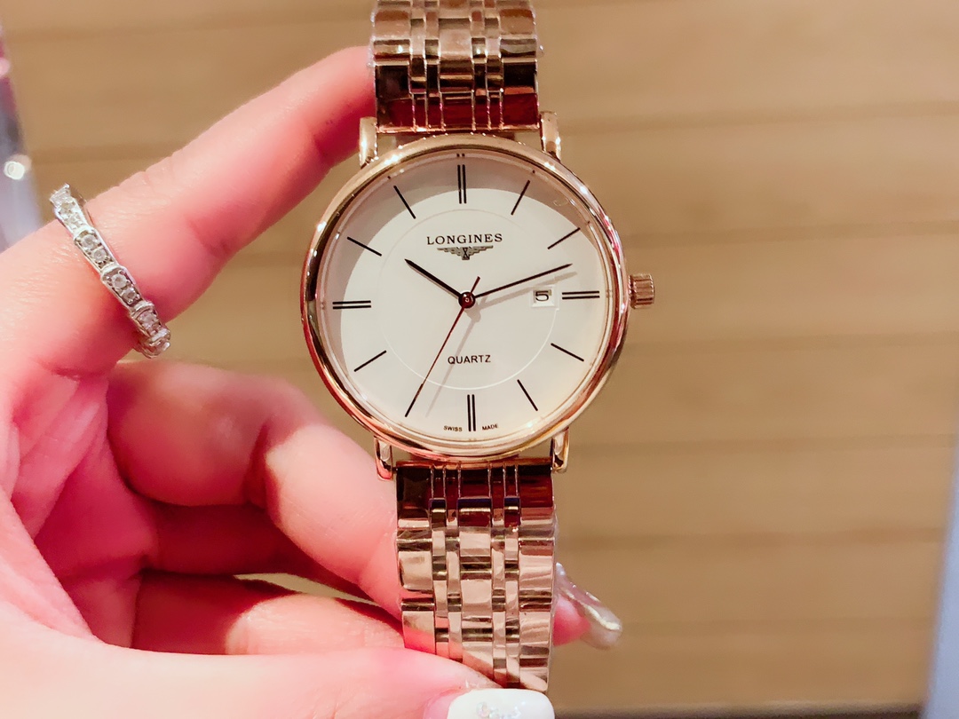 Longines 爱心原装进口石英机316L精钢表壳 矿物质超强玻璃镜面 进口真牛皮表带/精钢表带 女款直径30mm厚8m男款直径40厚底8mm