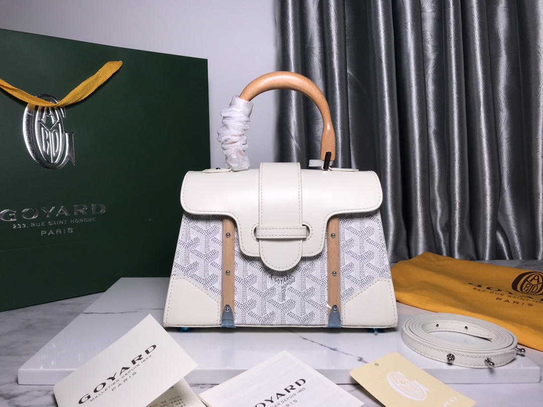 NO:186831,Extra-grade original leather Upgrade with original packaging, manual, yellow paper, labeling, ribbon. Goyard Sagon bag was launched in the 1930s. After launching the soft version of the Sagon mini bag, Goyard has innovated and insisted on continuous pursuit and breakthroughs of creativity, shaping the new structured Sagon mini bag. It has the same appearance as the original Sagon bag, with simple geometric lines and box making details, evoking Goyard's unique elegant charm and travel spirit with its small and exquisite appearance. The style is classic and conforms to the trend of contemporary people's preference for using 
