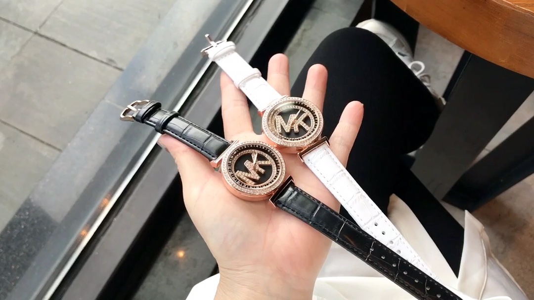 Michael Kors Women's Watch - Rotating Dial with Zircon Stones - Elegant Design