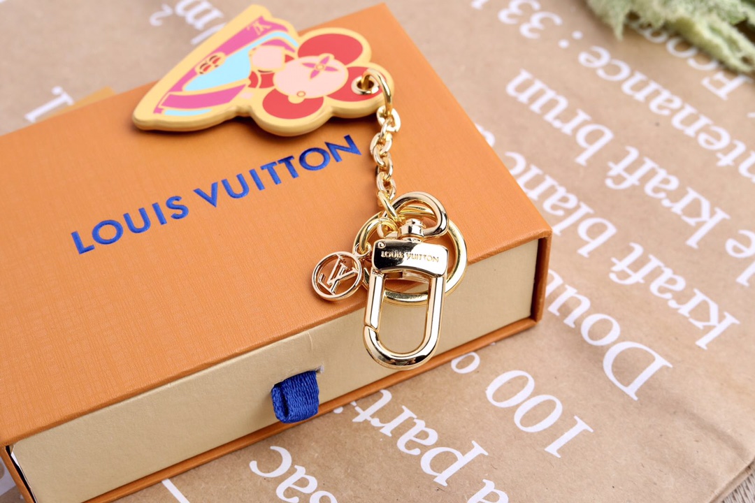 “Vivienne Funfair Xmas Bag: Colorful Metal Fittings and Dynamic Mascot Design” - 图片 4