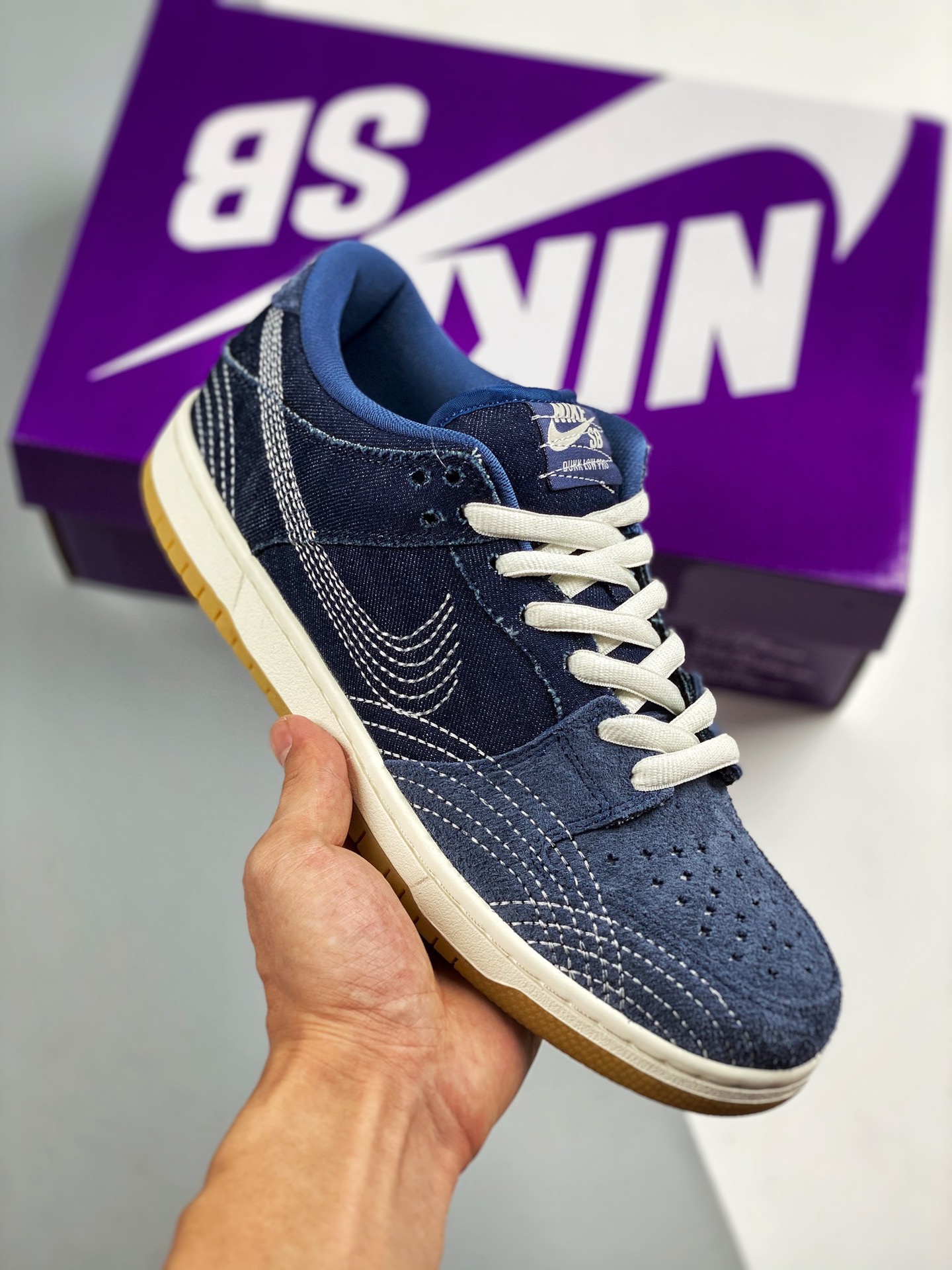 Nike SB Dunk Low Pro PRM 'Denim Gum' denim, light blue and dark blue denim upper design, with a Swoosh design…