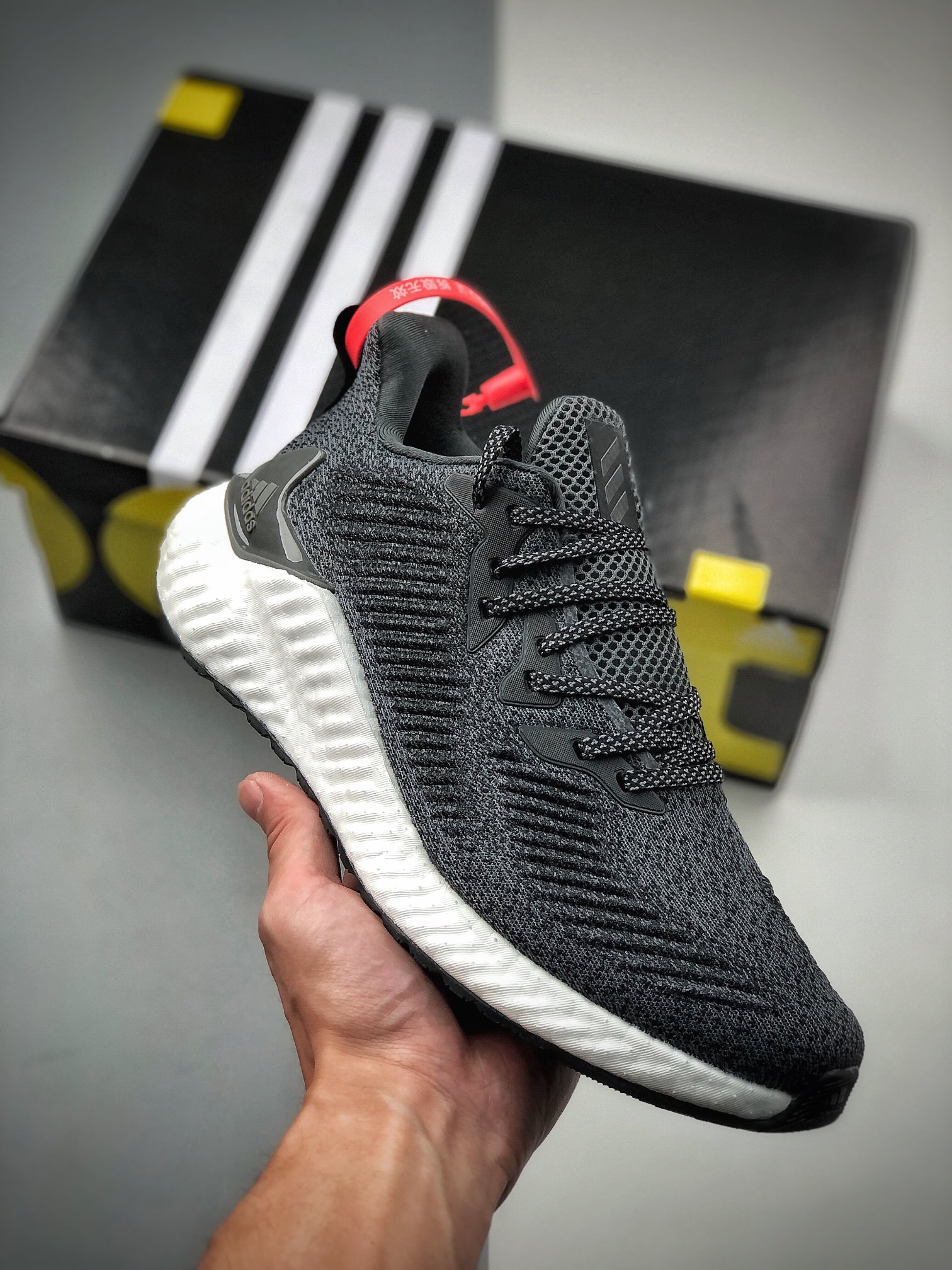 Nuevo producto Adidas Alphaboost System M con parte superior de punto, zapatillas casuales de running de esti…