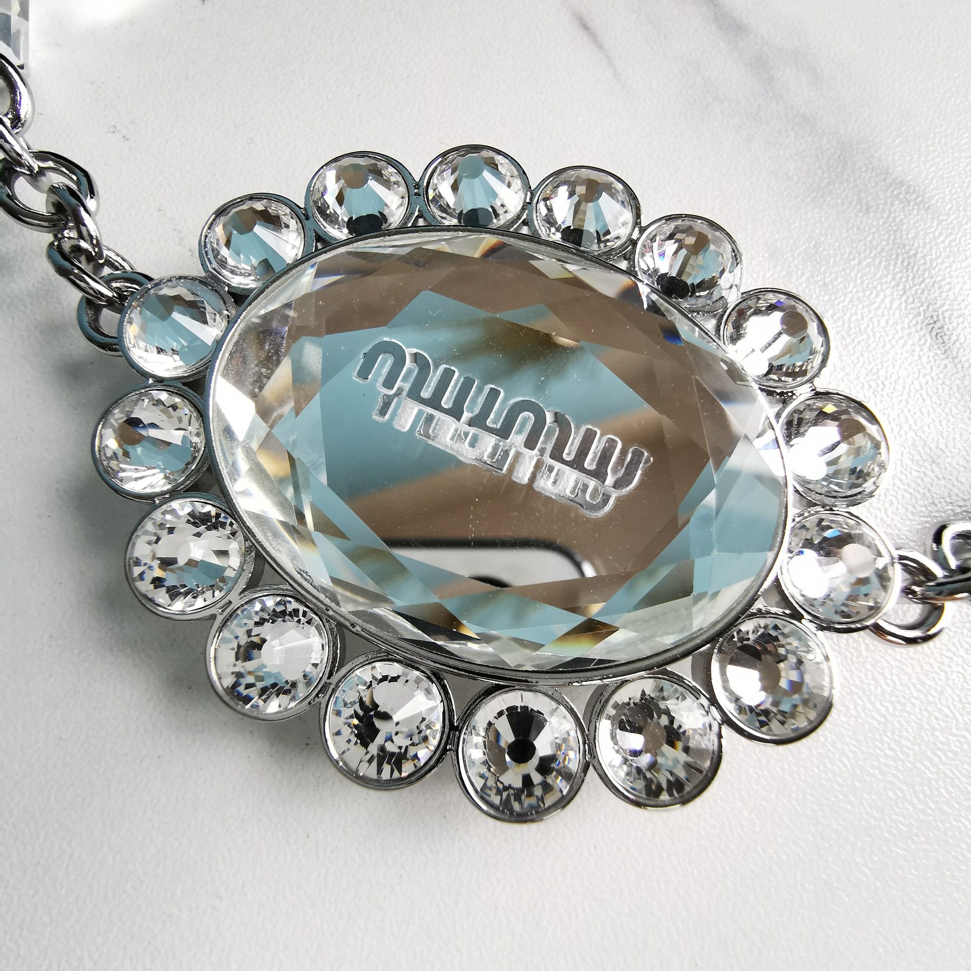 MIUMIU缪缪顶级进口Matelasse小羊皮经典压纹小花水桶包5BE050