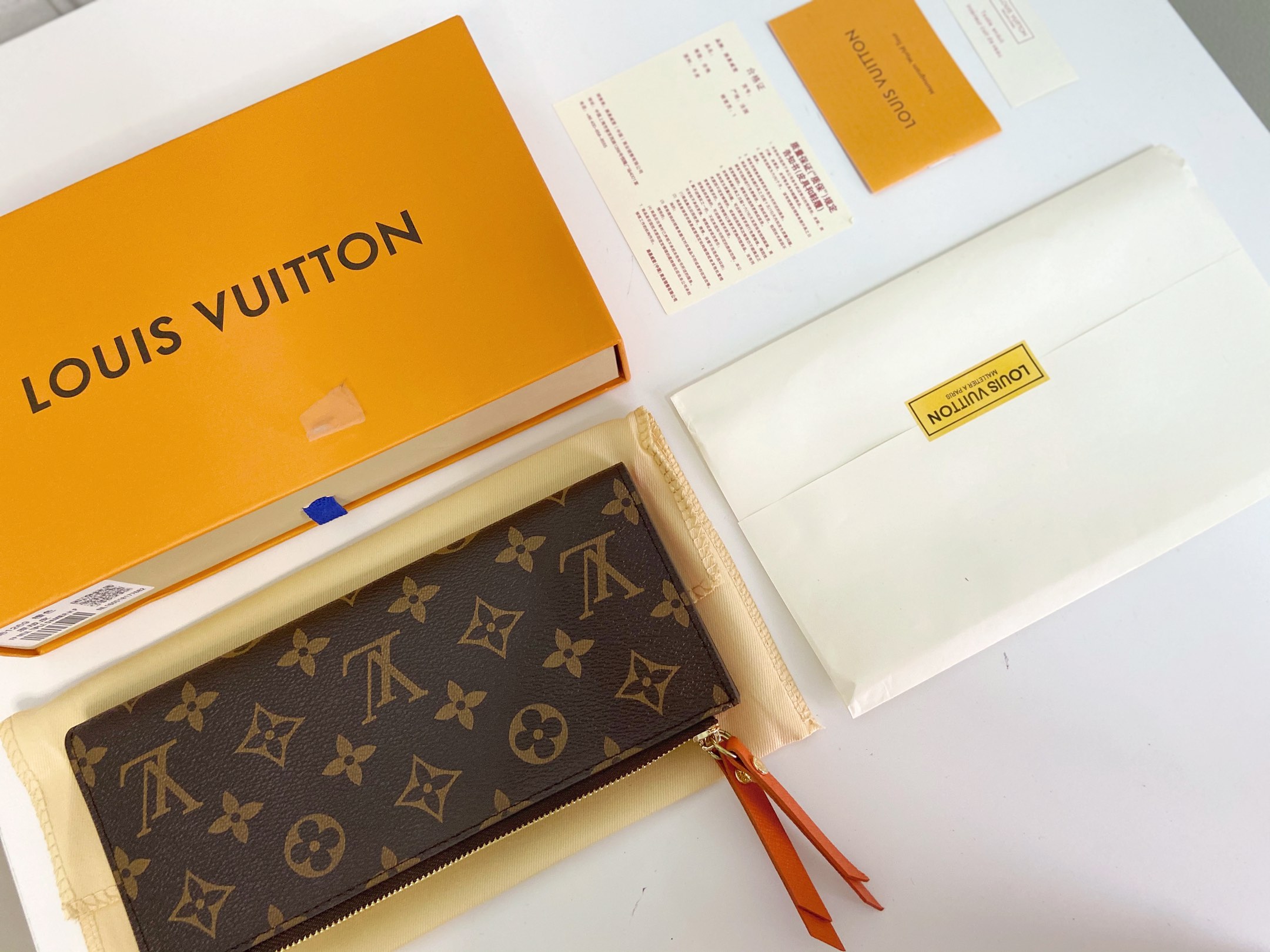 Combining Louis Vuitton’s iconic Monogram canvas with a brightly colored - Comprehensive