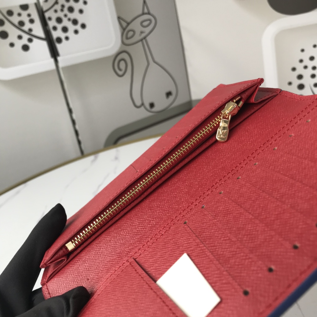 Slim profile leather bifold wallet in packaging