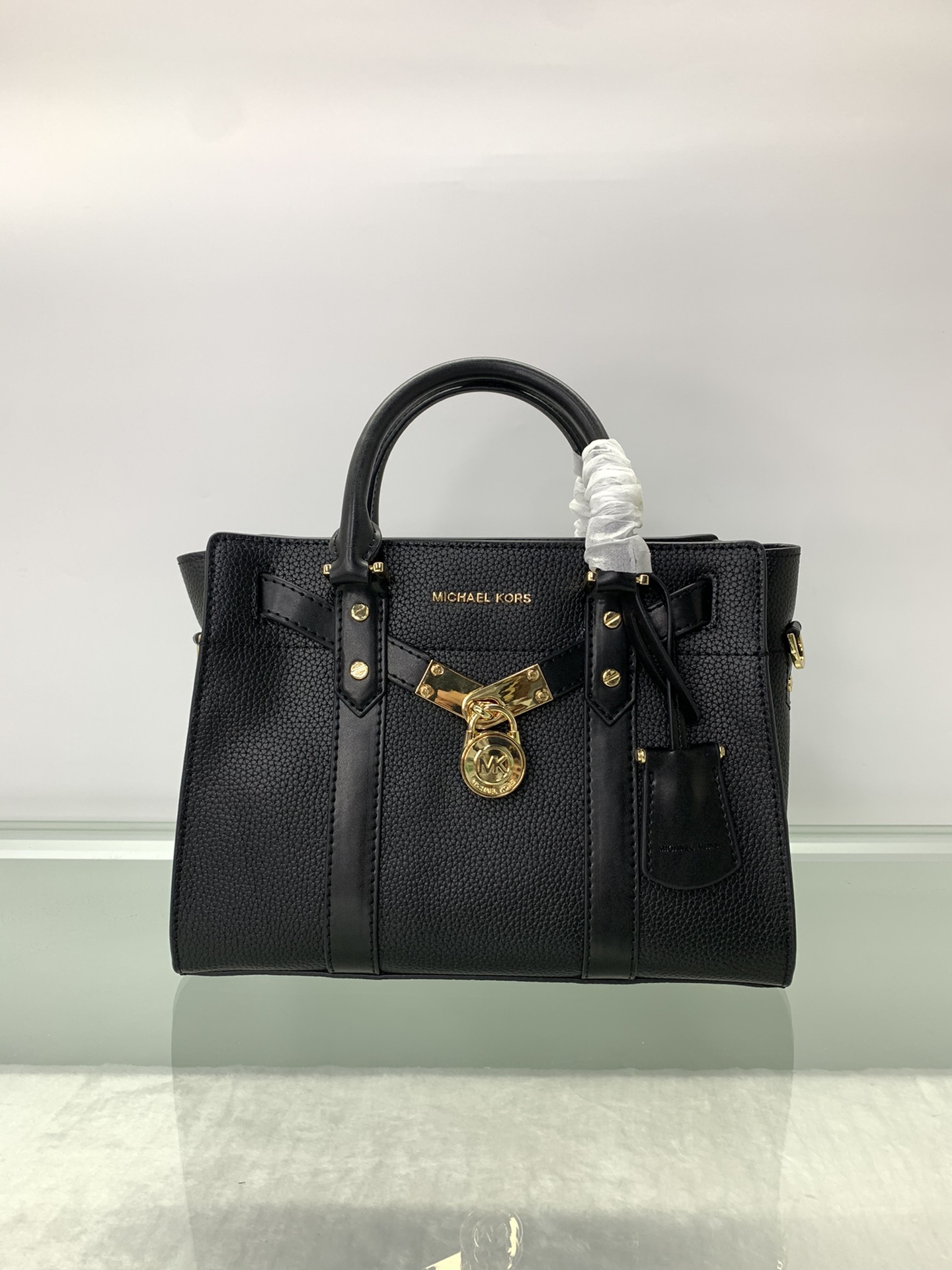 Michael Kors ～Nouveau Hamilton 手提大锁包 采用 老花皮革打造而成 是您打造日常造型的 之选