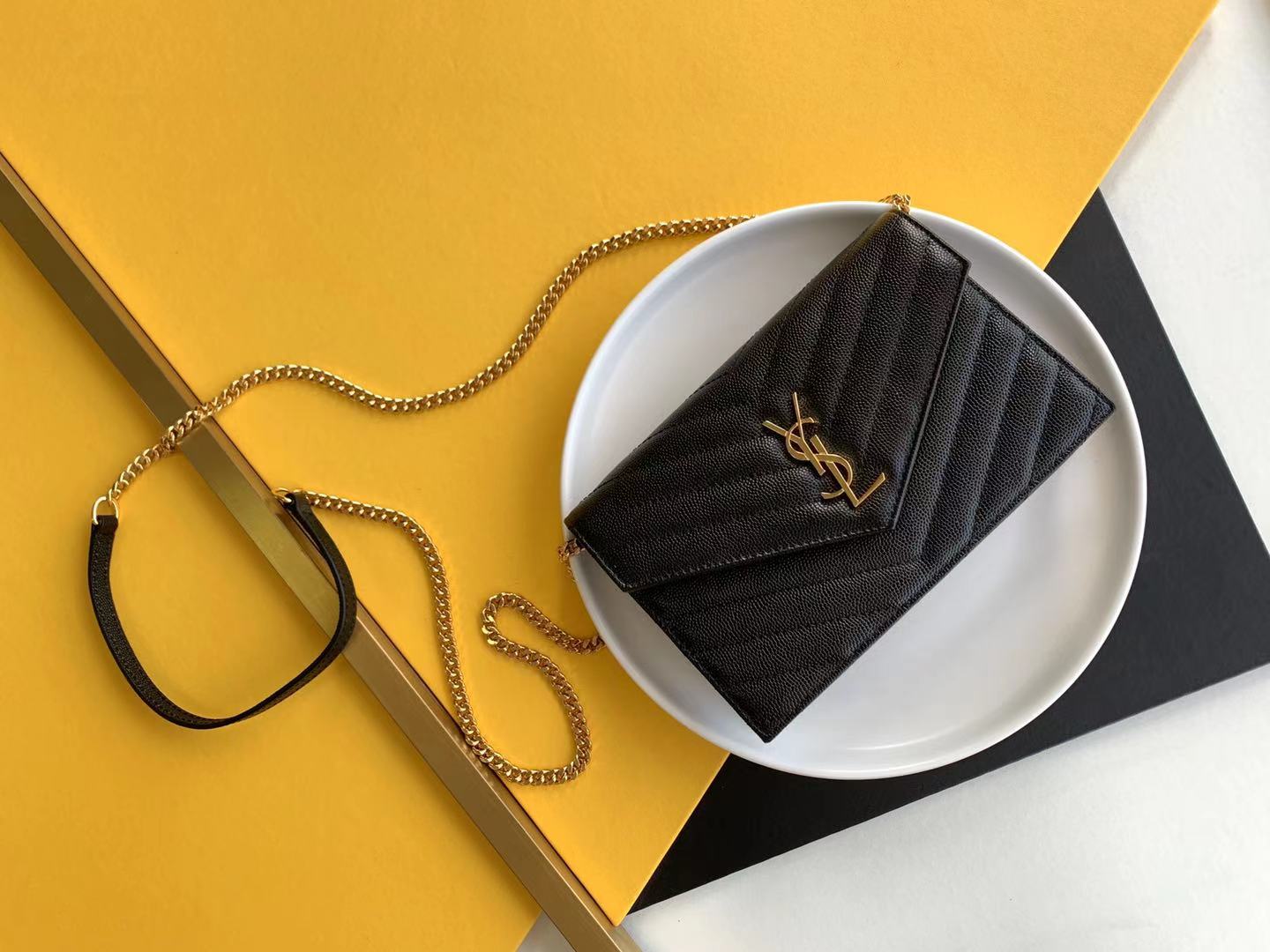 YSL grain leather chain bag clutch