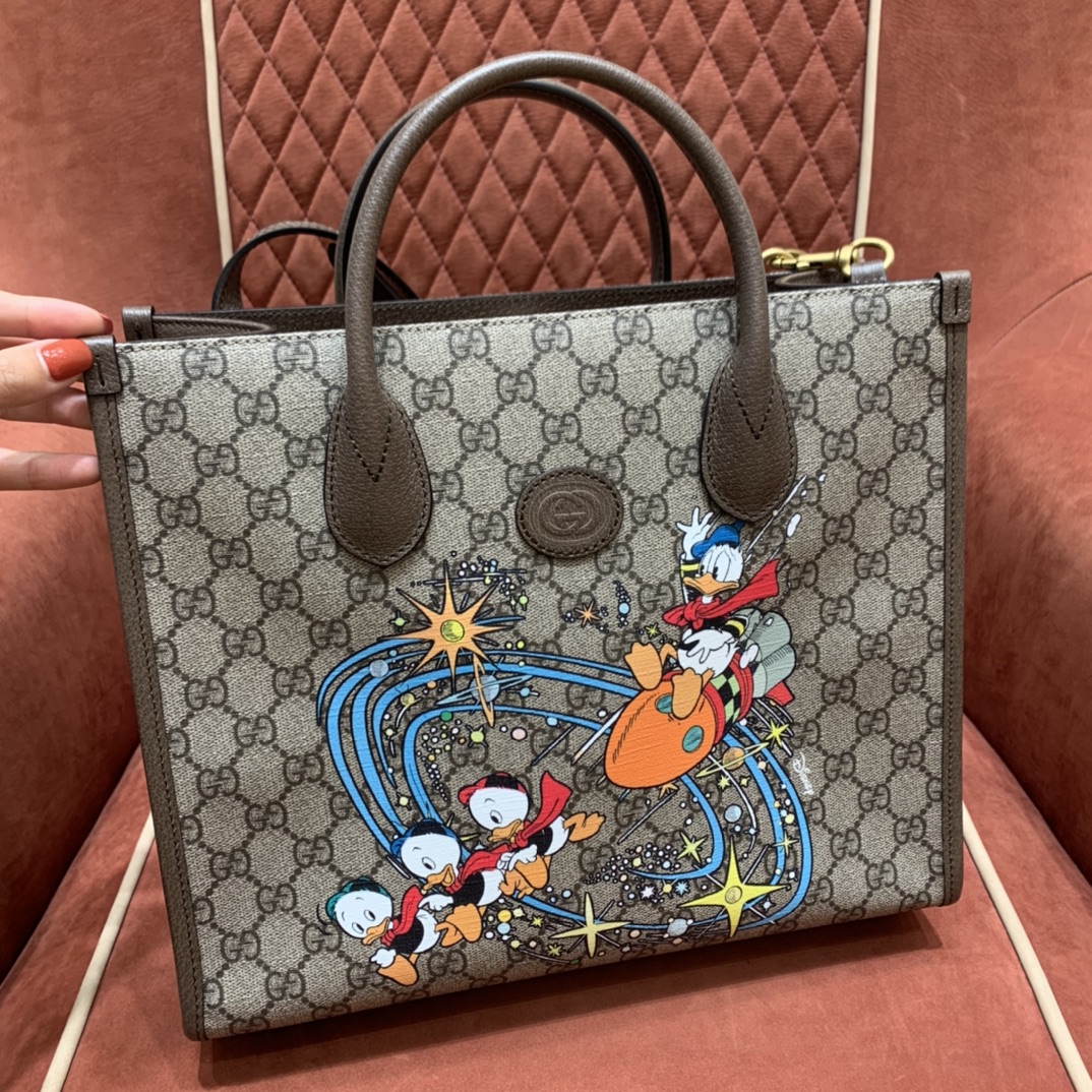 𝙂𝙪𝙘𝙘𝙞 𝙭 𝘿𝙞𝙨𝙣𝙚𝙮 𝙏𝙤𝙩𝙚唐老鸭购物袋31-GGteam