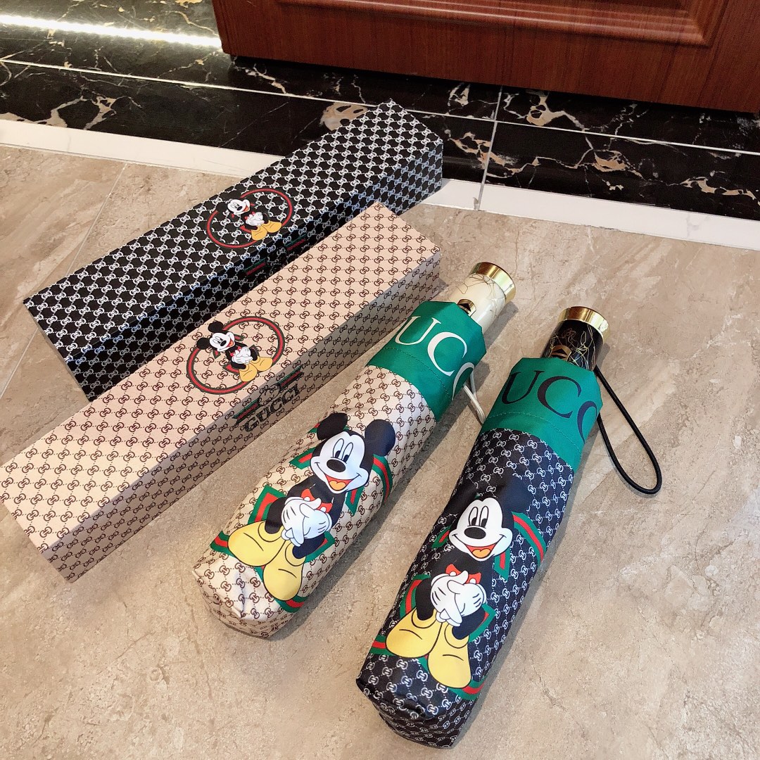 GUCCI古驰米奇米妮迪士尼合作款在今年席卷整个时尚界超方便一键开收全铝伞架一直以奢华以对时尚的独特设计