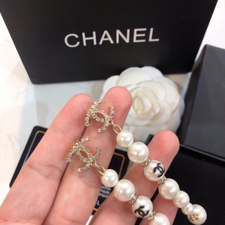 chanel gold pearl long pendant earrings