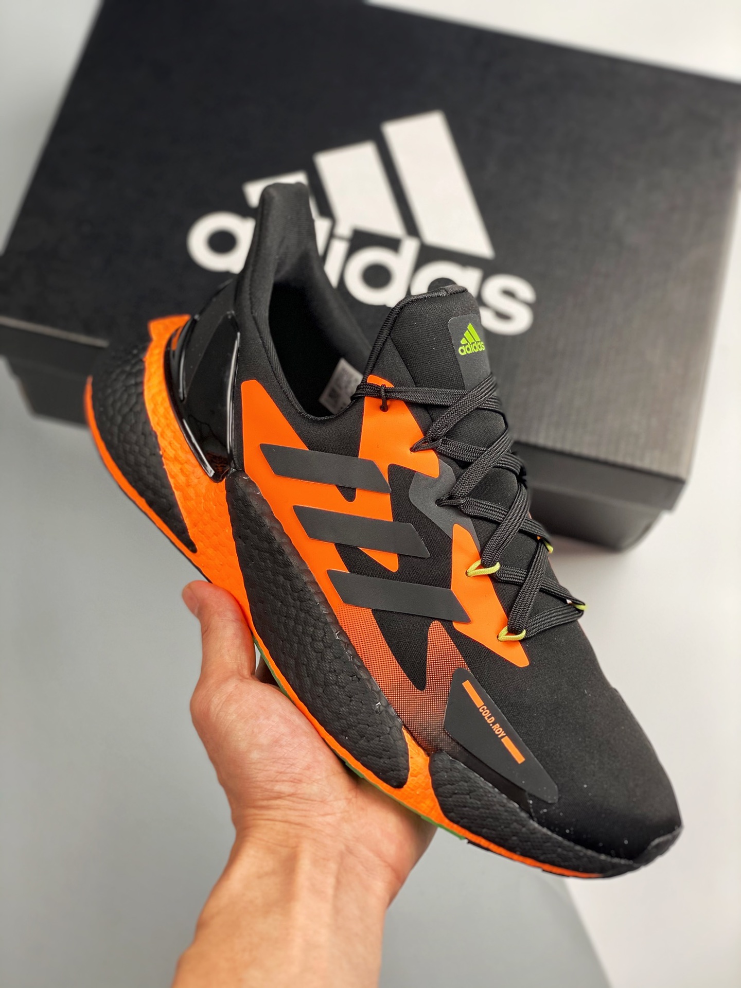 AD Boost X9000L4, diseño general muy dinámico, fotos reales en primer lanzamiento, parte superior de tejido con decorac…